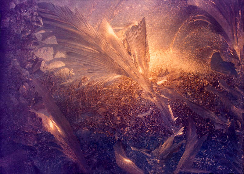 Sunlight shining through frost on bedroom window